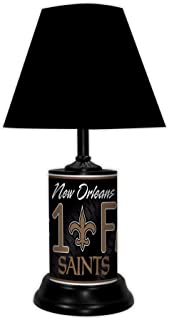 New Orleans Saints tabletop lamp featuring team colors, logo and wording "#1 Fan" with black base and black shade