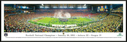 Panoramic of the 2011 BCS Championship Game featuring Auburn Tigers on the field with cheering fans in the stands.