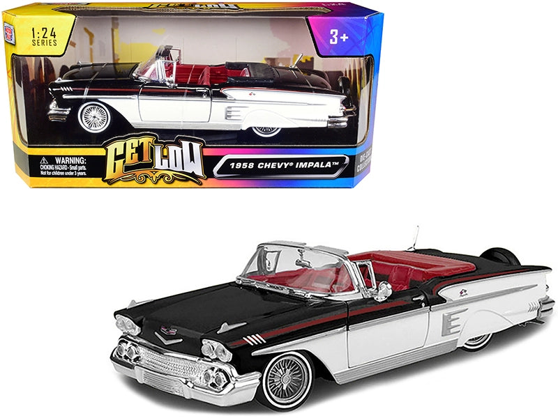 Motormax 1958 Chevrolet Impala Convertible Lowrider in black and white with red interior, 1/24 diecast model, Get Low Series, with opening hood, doors, and trunk.