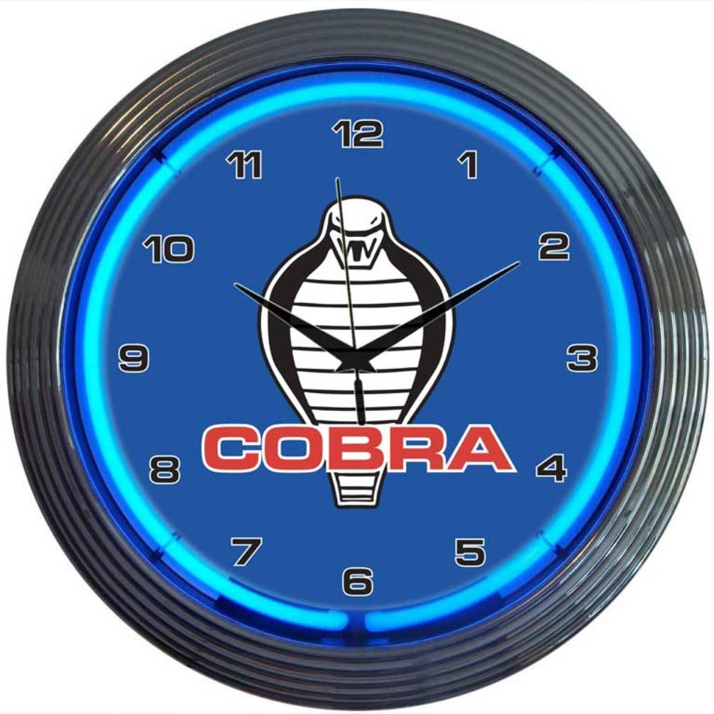 Ford Cobra 15" Neon Clock: New, indoor use, 15" round, 25W neon, chrome rim, AA battery clock, AC adapter, perfect for mancaves and bars. Neonetics.