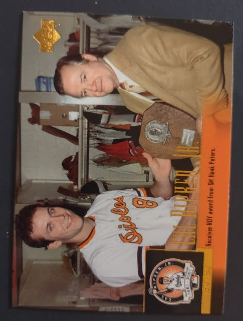 2001 Upper Deck Coca Cola Ripken #1 Cal Ripken Jr./Receives ROY award from GM Hank Peters -Baseball Card NM-MT