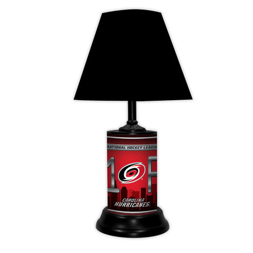 Carolina Hurricanes tabletop lamp featuring team colors, logo and wording "#1 Fan" with black base and black shade