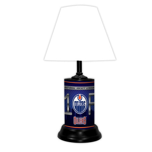 Edmonton Oilers tabletop lamp featuring team colors, logo and wording "#1 Fan" with black base and white shade
