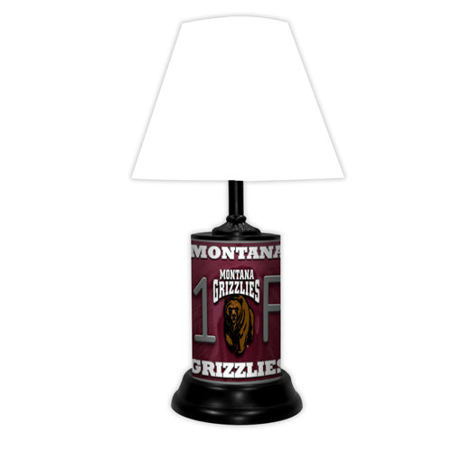 Montana Grizzlies tabletop lamp featuring team colors, logo and wording "#1 Fan" with black base and white shade