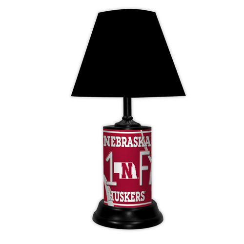 Nebraska Cornhuskers tabletop lamp featuring team colors, logo and wording "#1 Fan" with black base and black shade