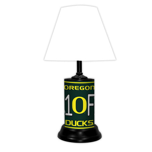 Oregon Ducks tabletop lamp featuring team colors, logo and wording "#1 Fan" with black base and white shade